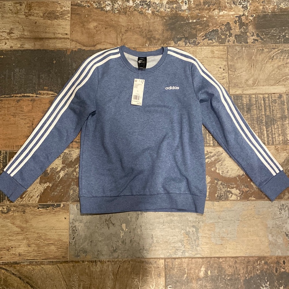 Girls Large Adidas Originals crew neck in perfect condition, has never been worn